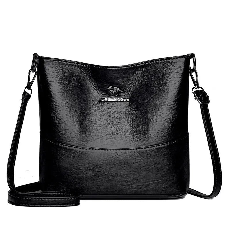 Women's bucket-shaped leather shoulder bag in minimalist style with large capacity