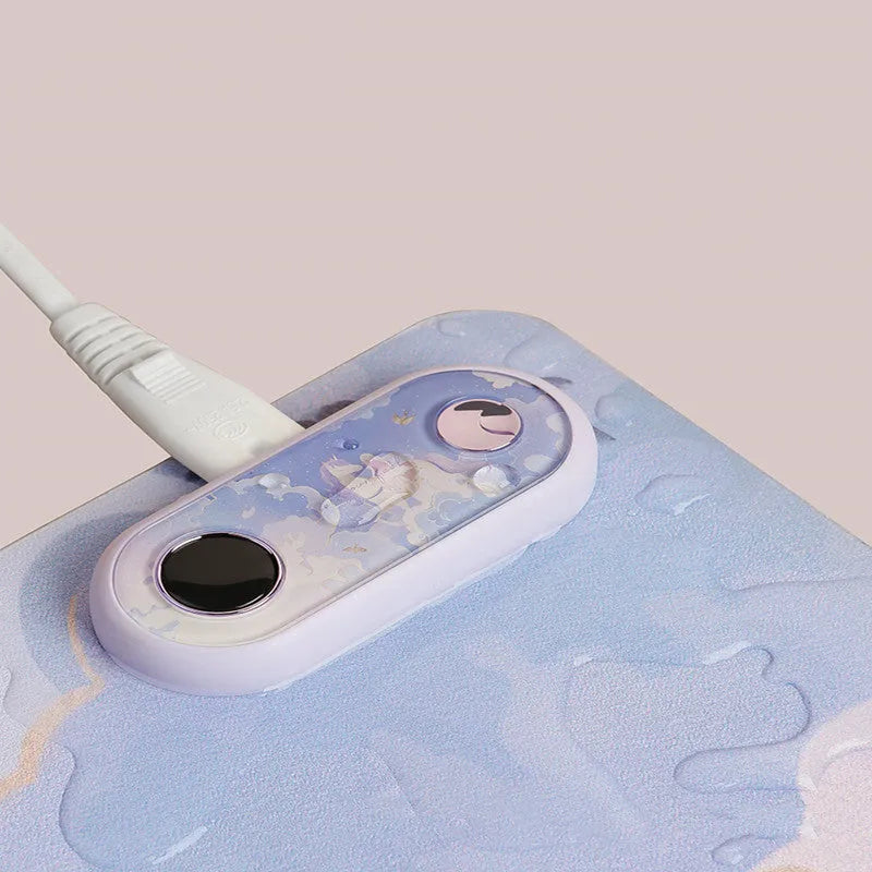 Office desktop electric heating pad with idyllic pattern on PVC leather surface for hand warming