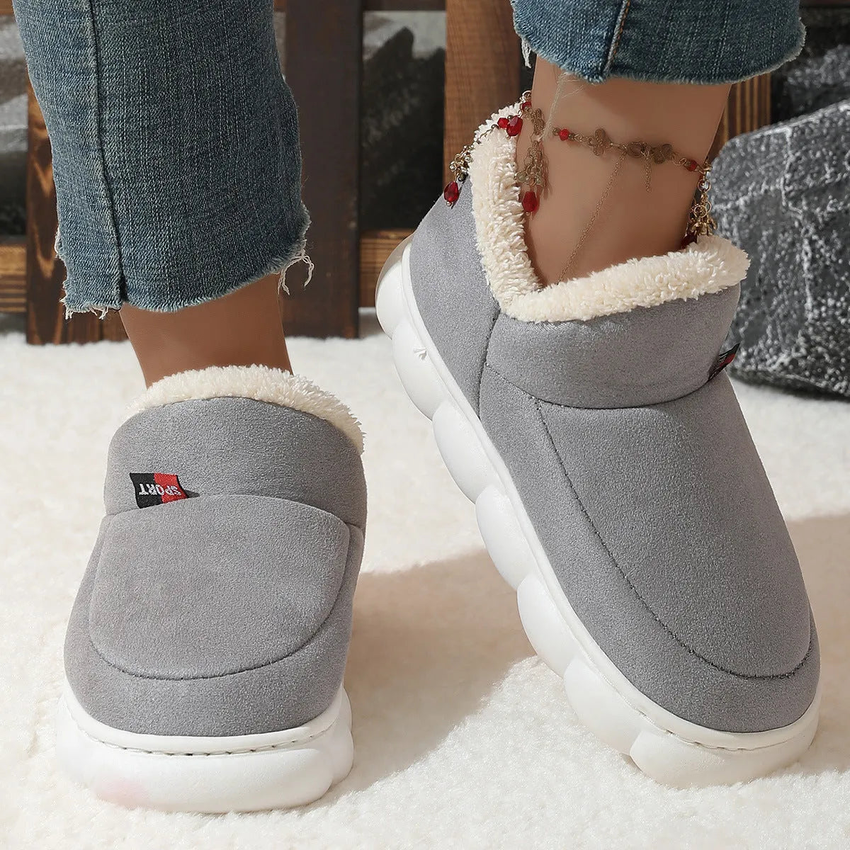 Winter plush cotton house shoes with soft velvet upper, suede lining, and thick rubber sole in solid colours.