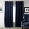 Navy blue blackout curtains with shading cloth fabric in vertical design, showing printed surface and perforated top for hanging