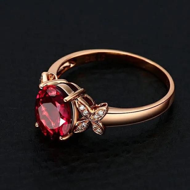 Women's 18k rose gold plated copper butterfly ring in a heart shape, shown in red and blue colour options.
