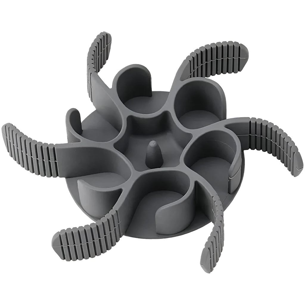 Red silicone dog slow feeder insert with spiral design and suction cups on a white background.