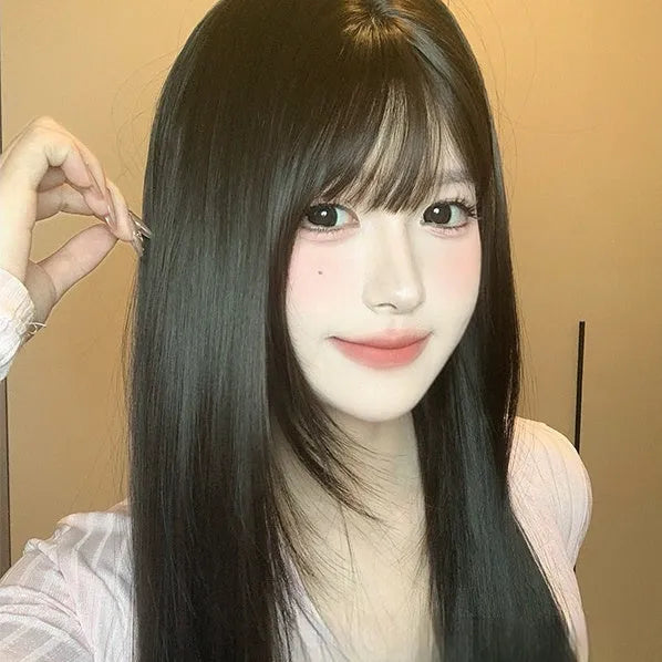 Dark brown women's wig with long straight hair and bangs style on wig head