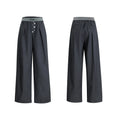 Straight-leg suit trousers in black with high waist and button-open line design, made from polyester-cotton blend.