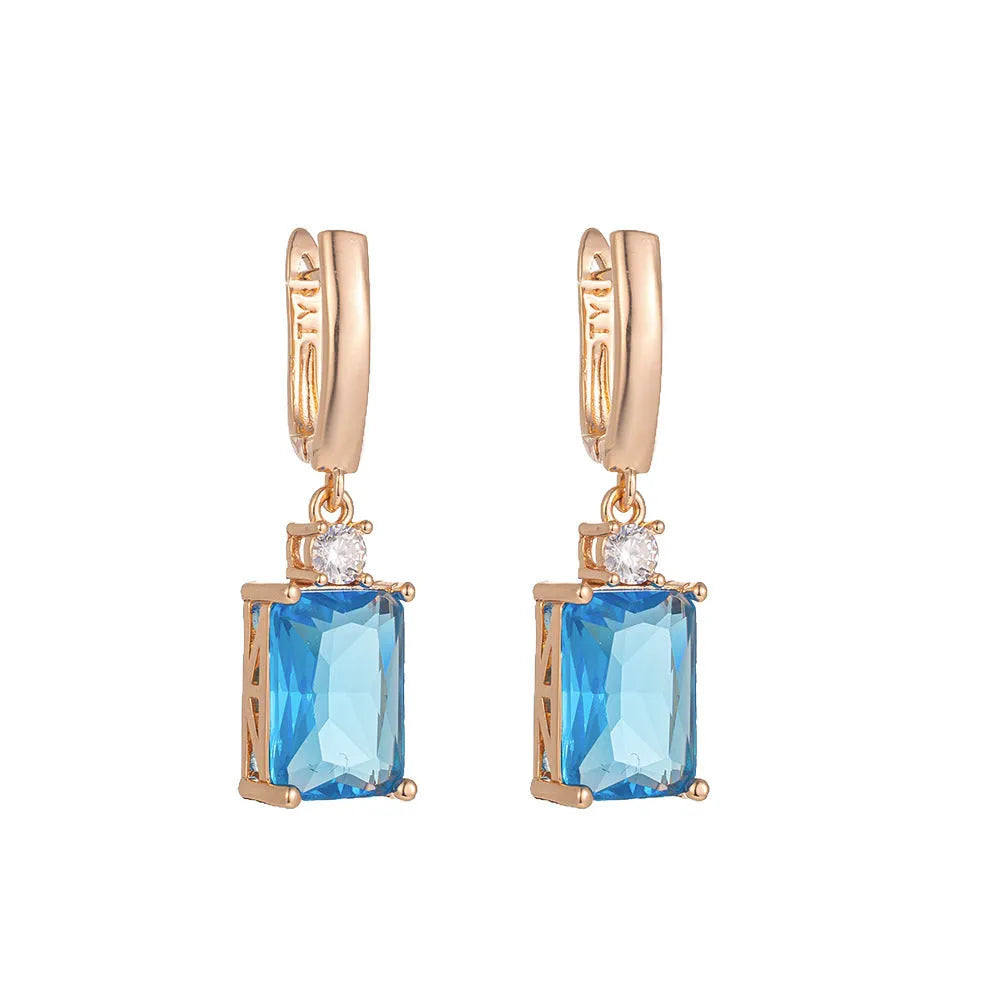 Pair of square geometric earrings with quadrilateral design in gold or silver electroplated finish on copper
