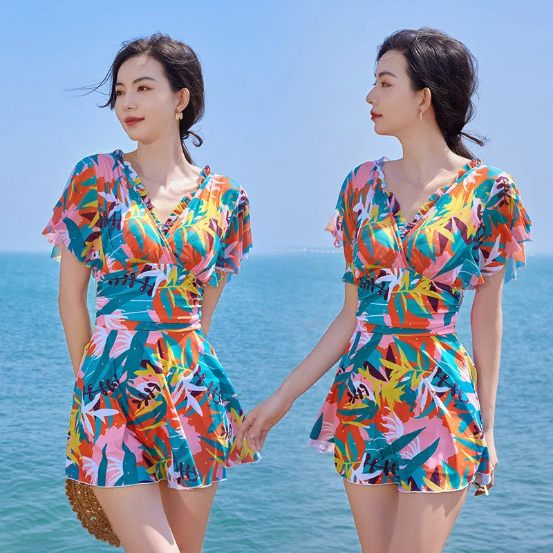 Women's cover belly one-piece swimsuit with colourful printed pattern in polyester fabric
