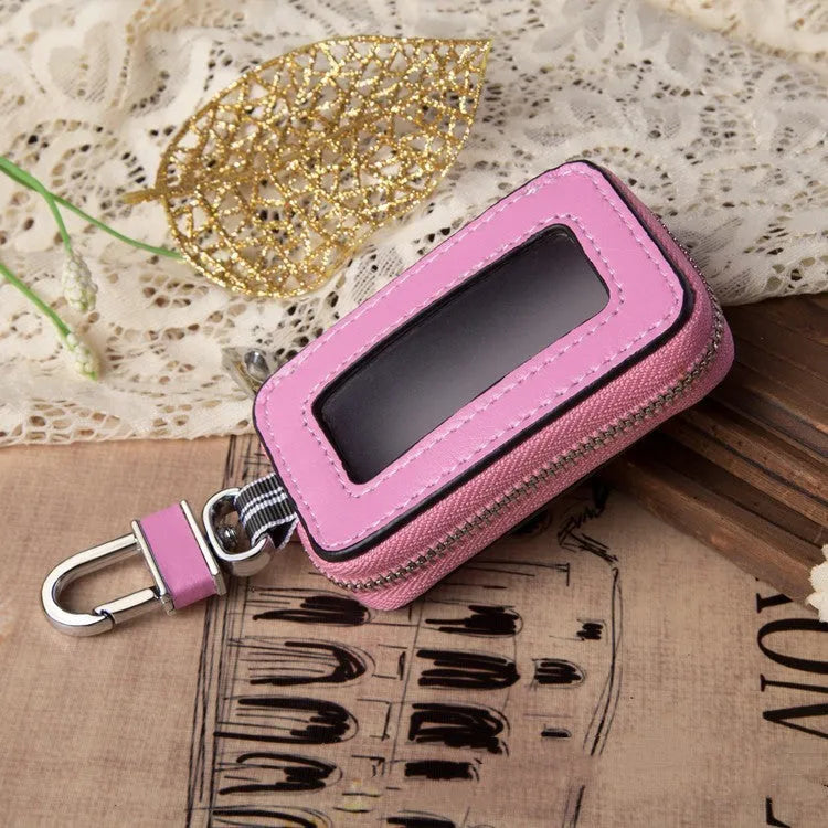 White genuine leather car key case with square vertical design and plain weave texture