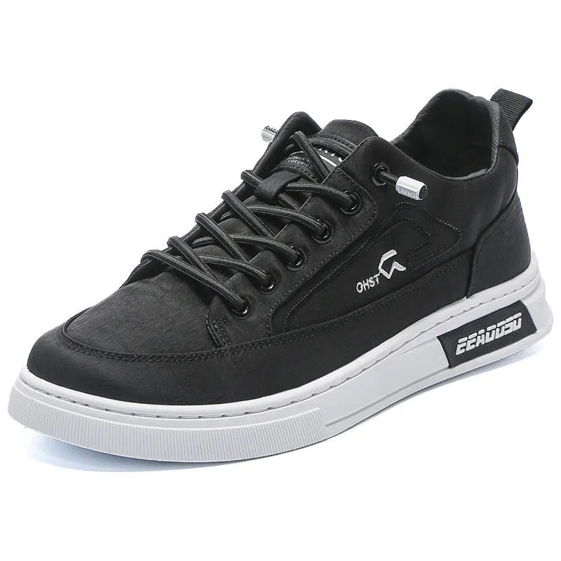 Grey men's canvas casual shoes with round toe and front lace-up design