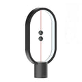 Mini magnetic switch USB LED table lamp with floating switch, plastic shade, available in black, green, pink, red, white, and wooden colour.
