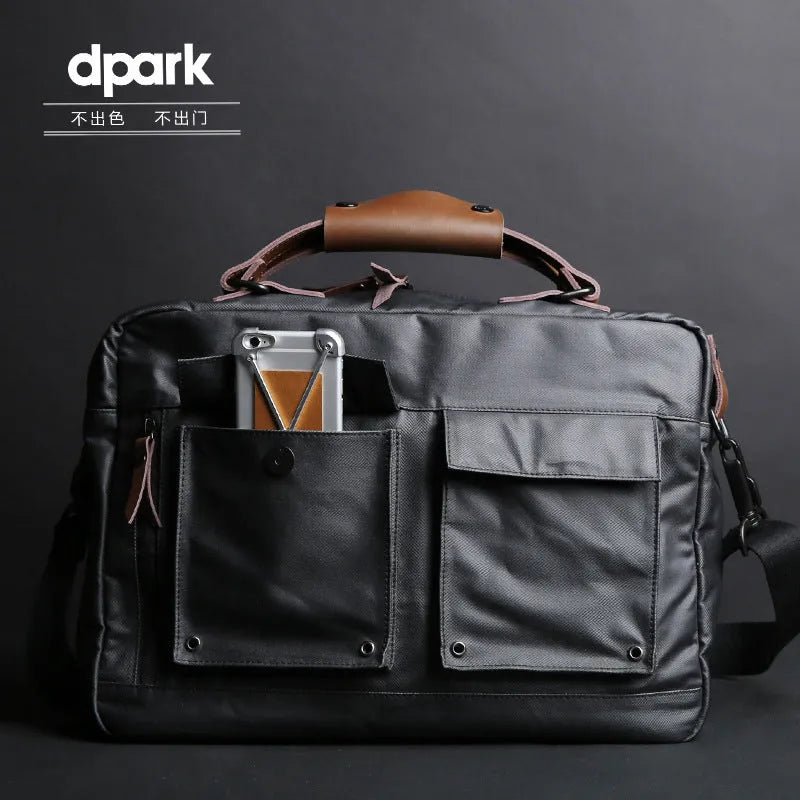 Dpark 14/15 inch laptop bag with single shoulder strap in Black colour, showing padded compartment and organisational pockets