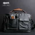 Dpark 14/15 inch laptop bag with single shoulder strap in Black colour, showing padded compartment and organisational pockets