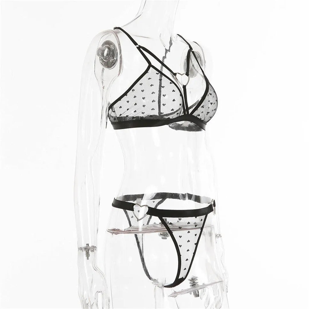 Ladies' black mesh spandex two-piece set showing top and trousers on a mannequin.