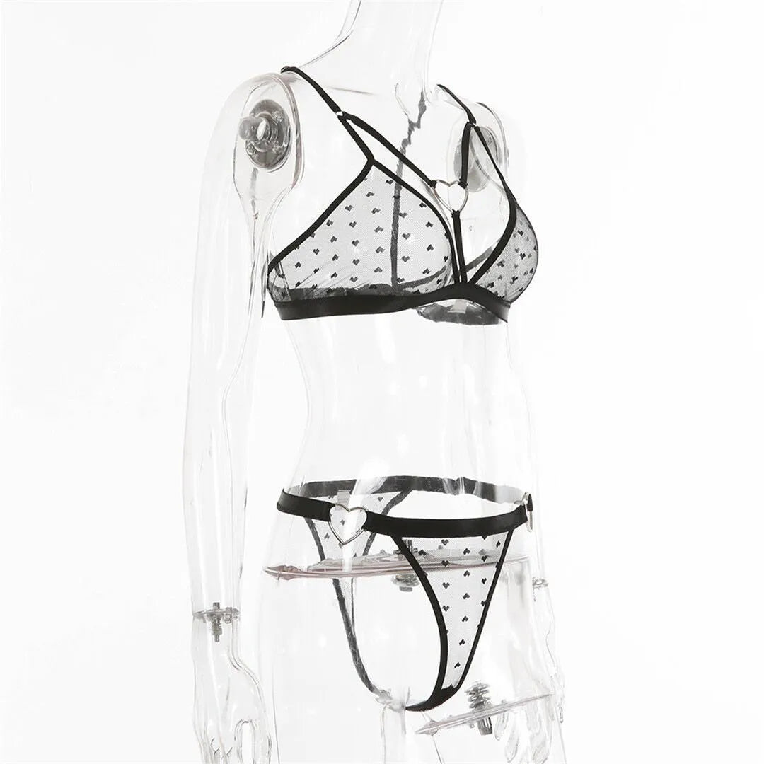 Ladies' black mesh spandex two-piece set showing top and trousers on a mannequin.