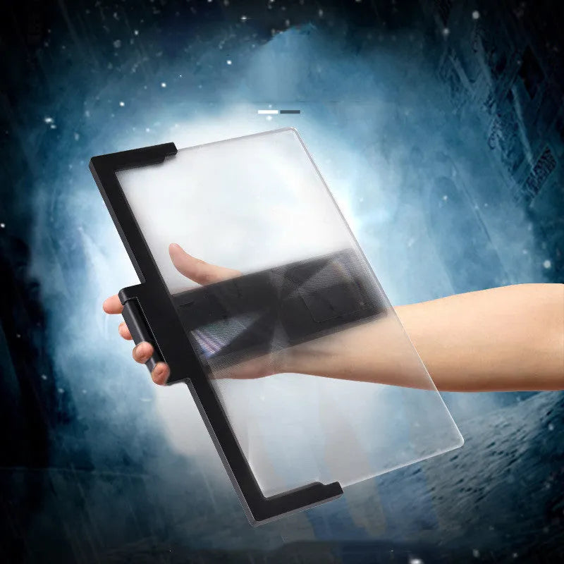 Black and white magnifying mobile phone stand on a desk for hands-free use.