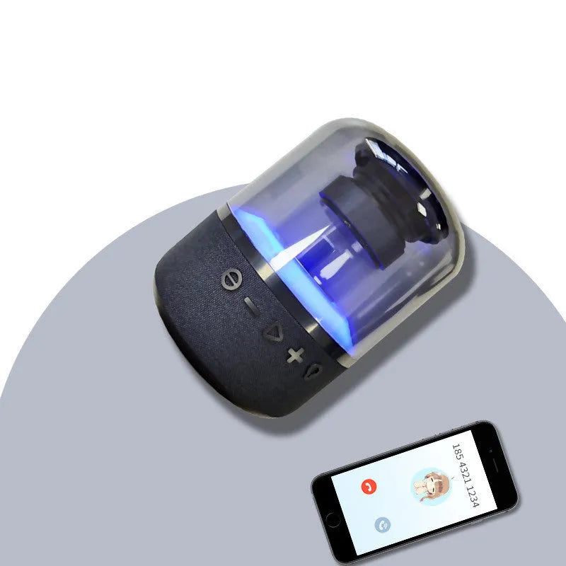 Black wireless Bluetooth speaker with 360-degree sound, compact design, and mechanical keys for control
