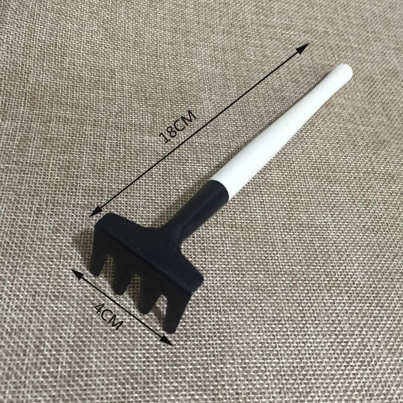 Succulent gardening tool set showing 14 implements including tweezers, watering can, and mini tools for plant care