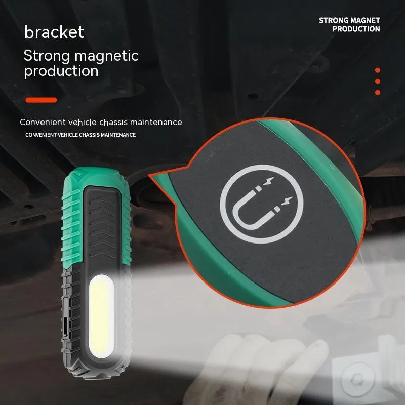 Black and green USB rechargeable auto repair work light with a durable plastic housing.