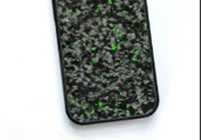 Samsung Galaxy phone case in Forged Red colour, showing aramid fibre texture and slim fit on a phone