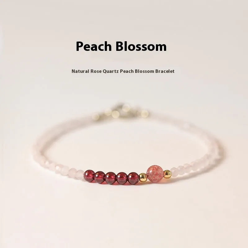 Handmade pink crystal and strawberry quartz bracelet with animal zodiac charm