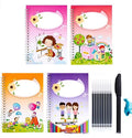 Hard cover magic practice writing book set open on a page, with pen holder and refills alongside.