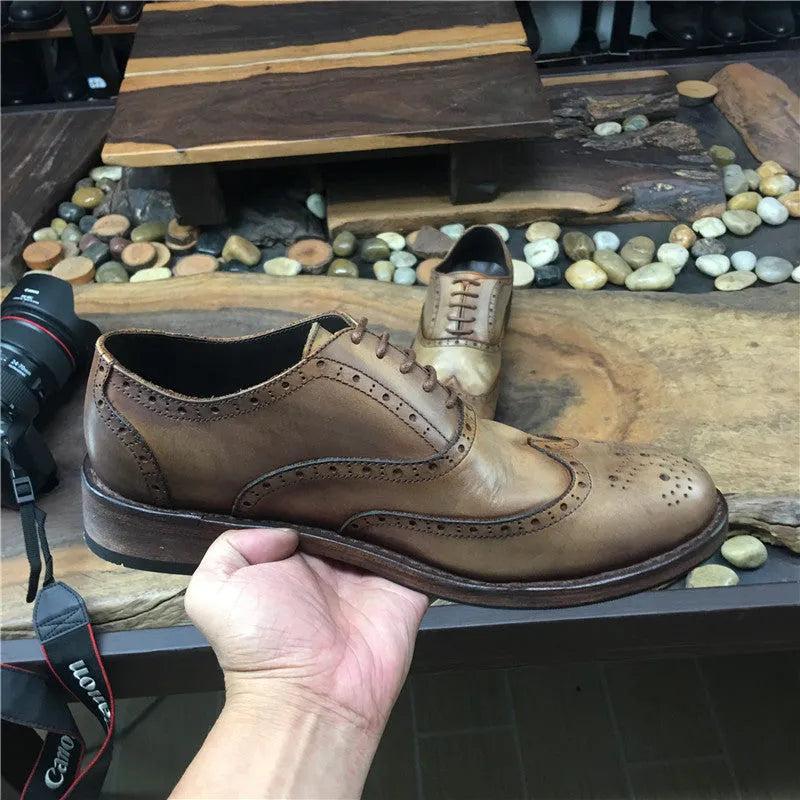 Men's light brown vintage engraved handmade distressed leather shoes with lace-up closure and round toe