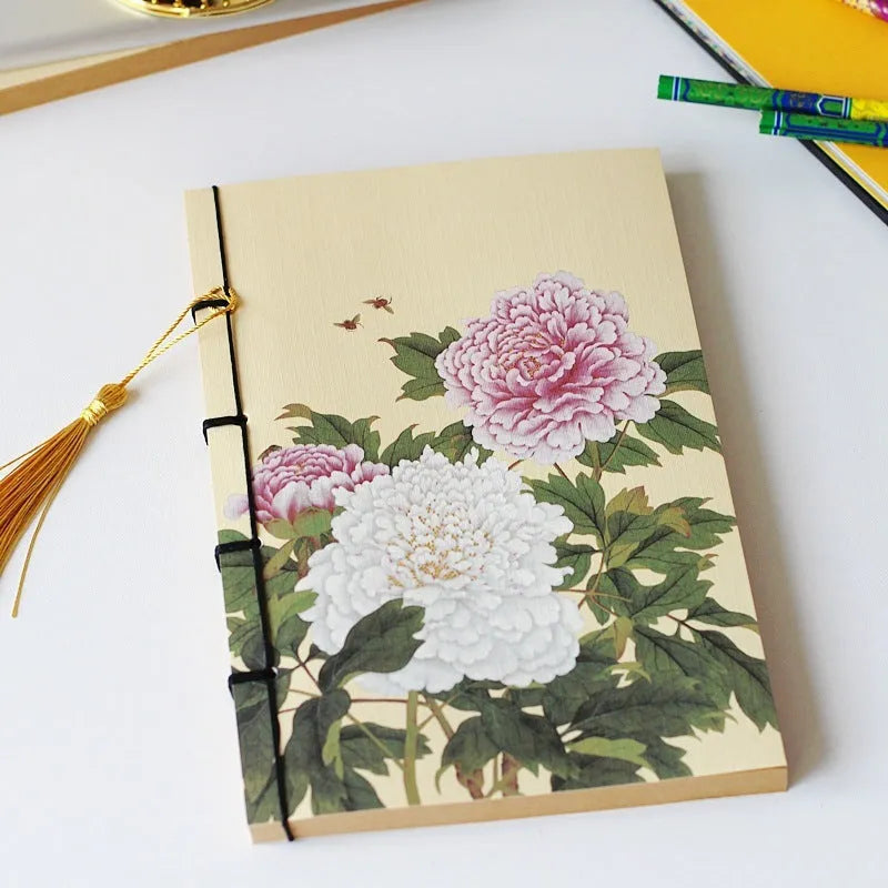 A5 antique-style wire-bound notebook with vintage Chinese painting cover, thread binding, and black wax rope tassel.