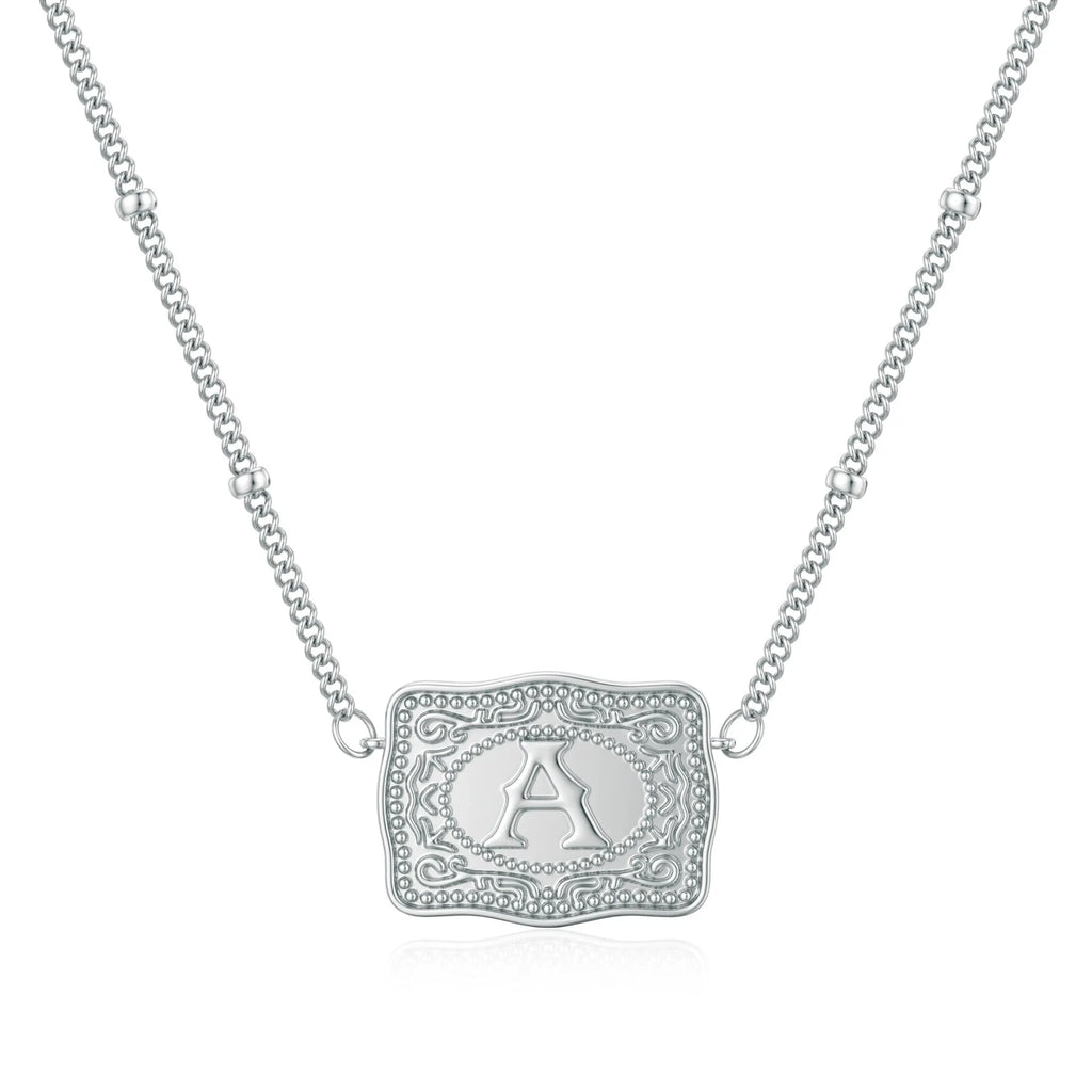 Copper electroplated initial letter necklace on a chain, available in gold and white gold colours.