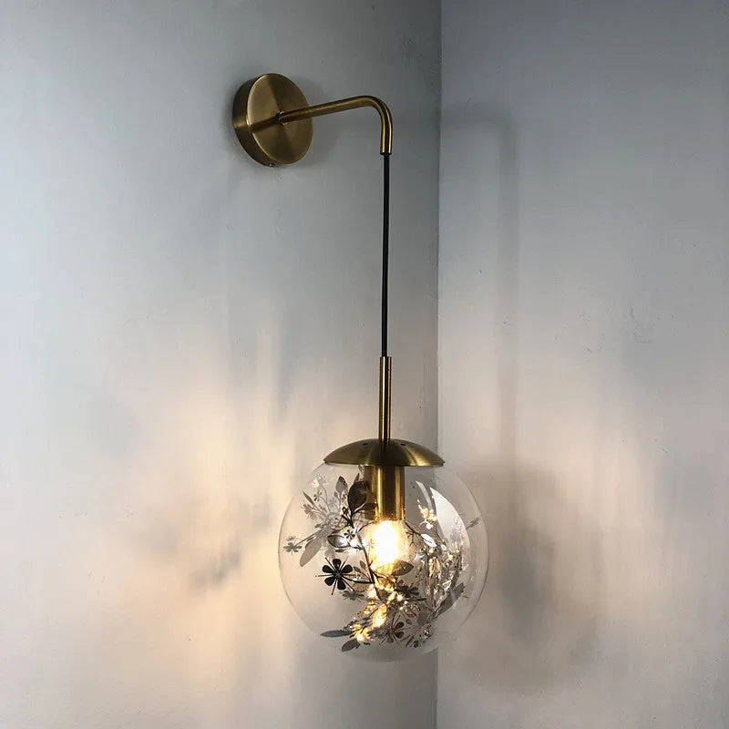 Glass bedside wall lamp with LED lighting in golden flower finish measuring 20cm diameter