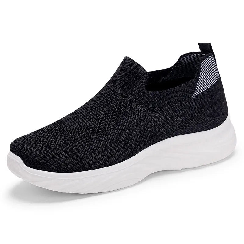 Women's solid colour Flyknit casual running shoes with a round toe and soft PVC sole.