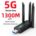 Black USB network transmitter device with four extended antennas