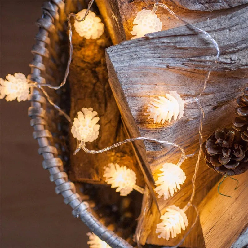 Warm white LED pine cone light string with battery operation for decorative lighting