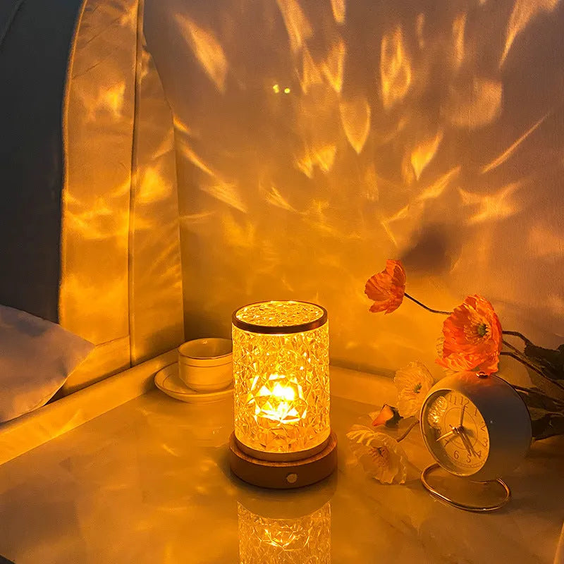 Rotating water ripple night light with acrylic body and solid wood base measuring 9.5cm wide