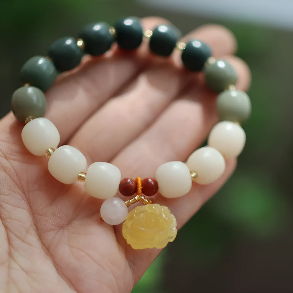 Gradient white jade bodhi bracelet with beeswax lotus pendant, 10mm flower beads
