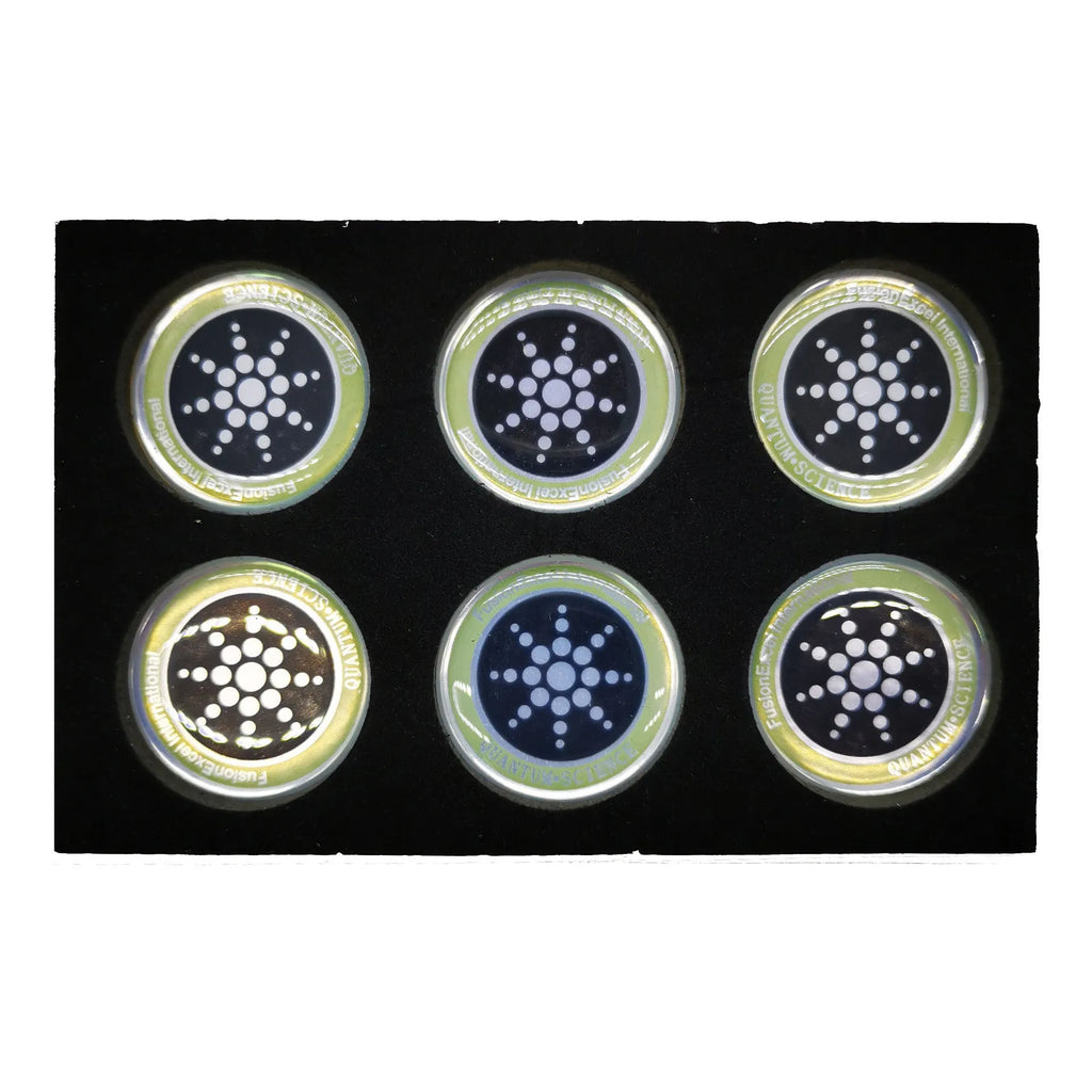 Six gold and silver anti-radiation phone stickers on backing sheet