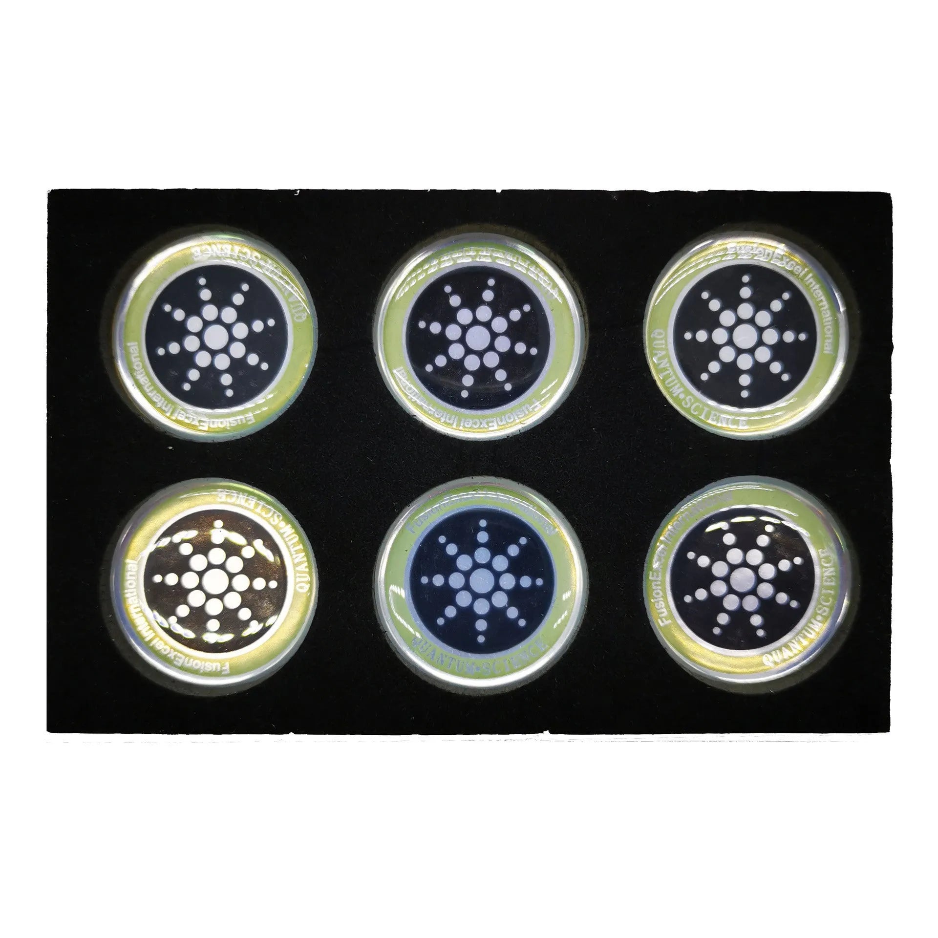 Six gold and silver anti-radiation phone stickers on backing sheet