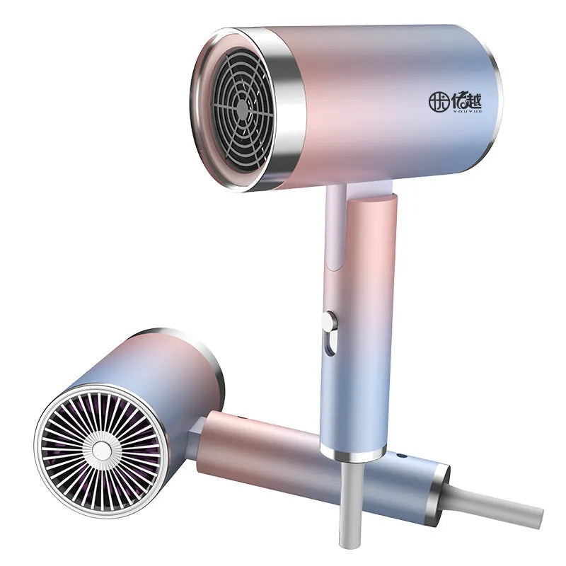 Foldable negative ion hair dryer in emerald green with folded handle and single nozzle