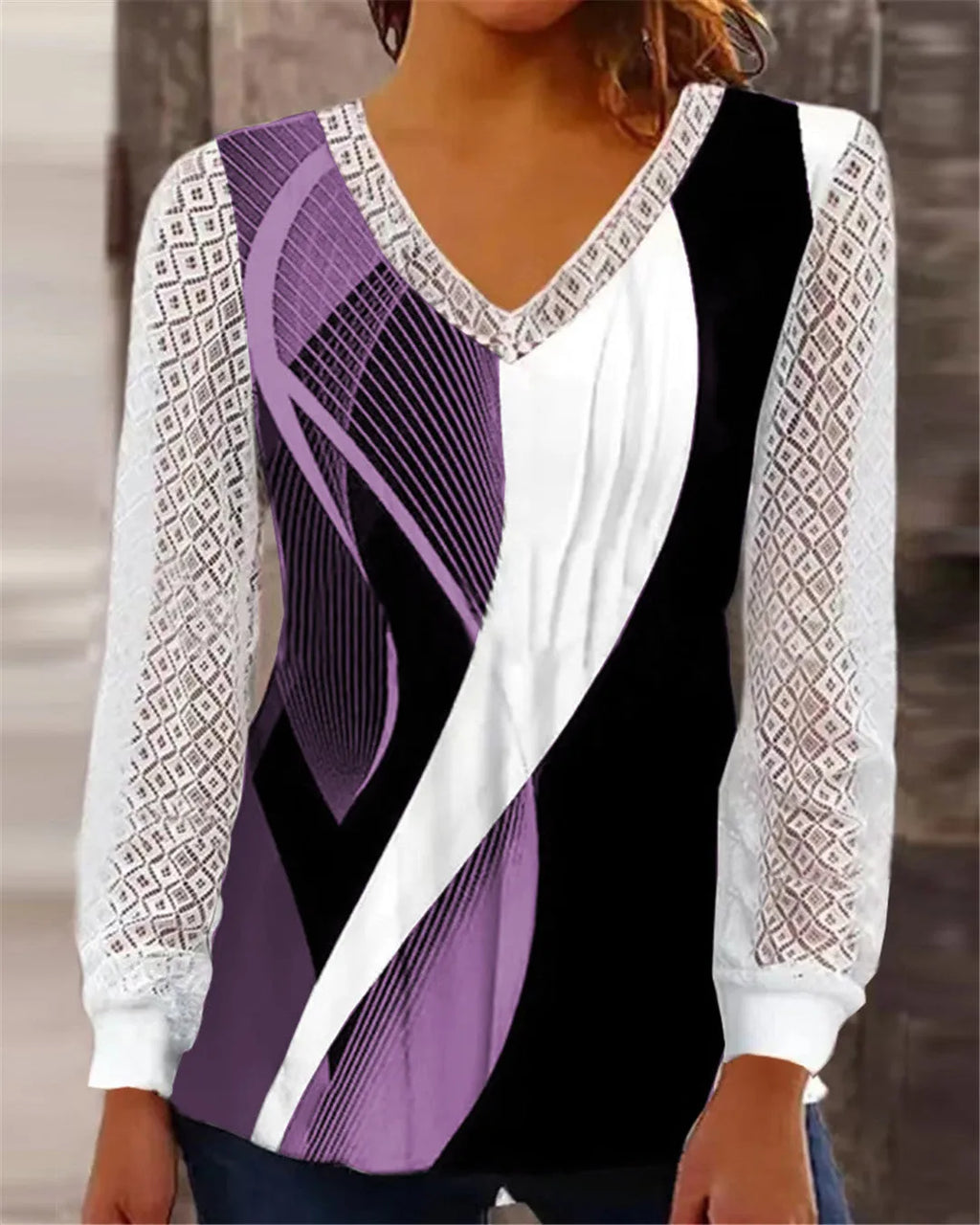Purple V-neck loose pullover top with hollow-out lace print detailing and long sleeves