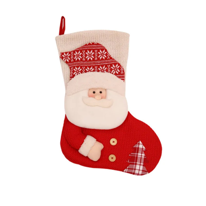 Large red white knitted Christmas stocking with Santa Claus design hanging above fireplace