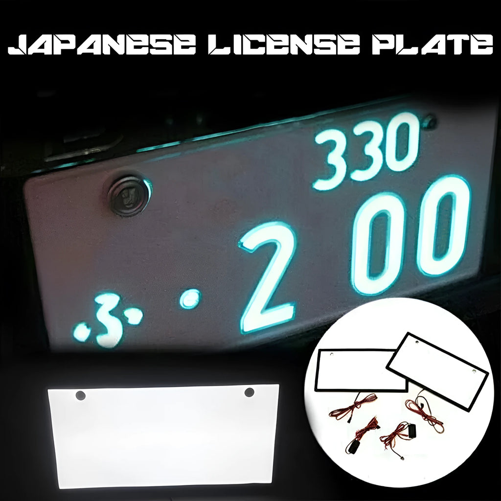 A pair of black plastic LED licence plate light bars for trucks on a white background.