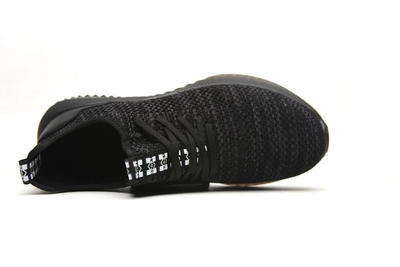 Steel toe cap safety shoes in black with EVA midsole for shock absorption, low-cut design