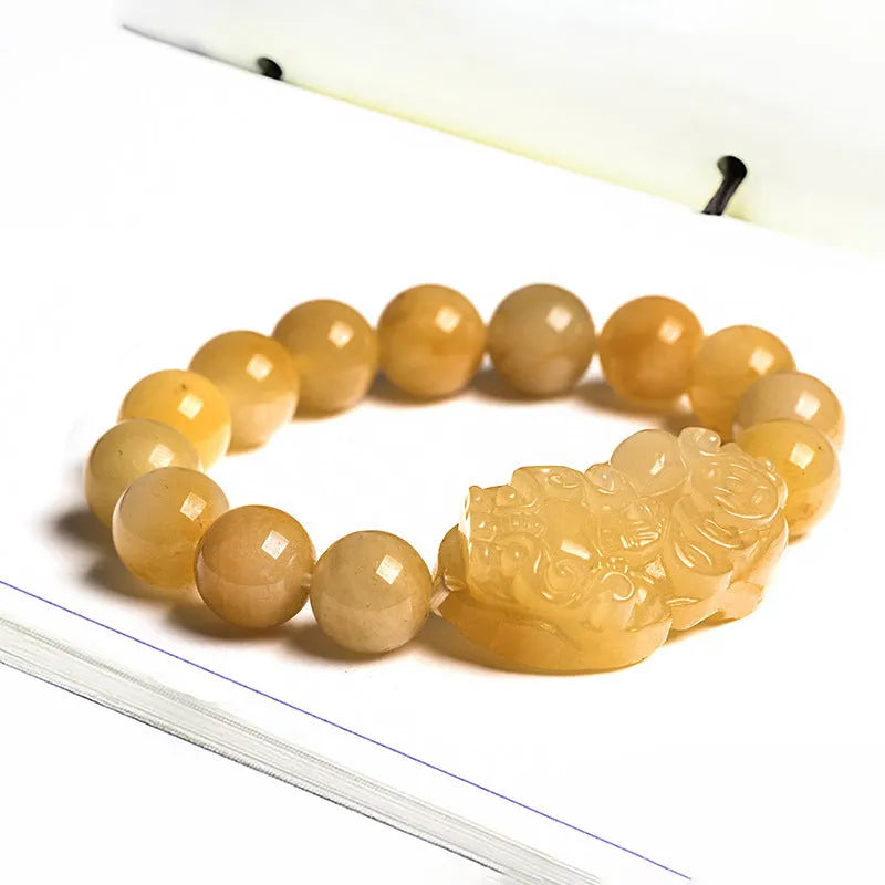 Hand-carved Jinsi Jade money bracelet with golden thread patterns, showing large and small size options for unisex wear