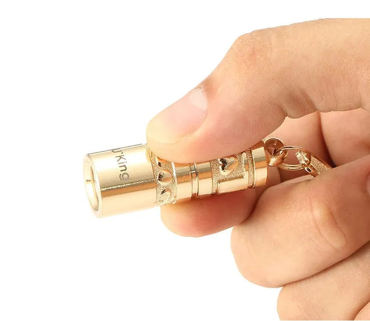 Gold zinc alloy waterproof LED flashlight keychain with mini portable design for emergency outdoor use