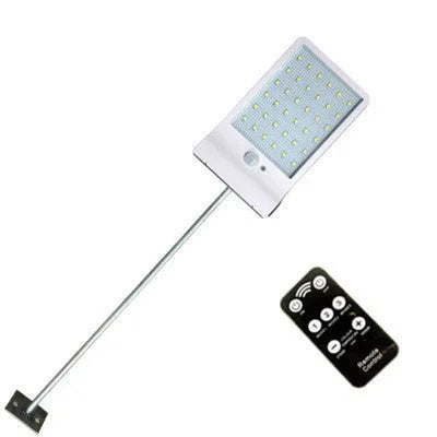 Solar garden light with solar panel and LED illumination for outdoor use in black or white colour