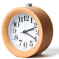Solid beech wood circular alarm clock with silent snooze function measuring 9.5cm in diameter