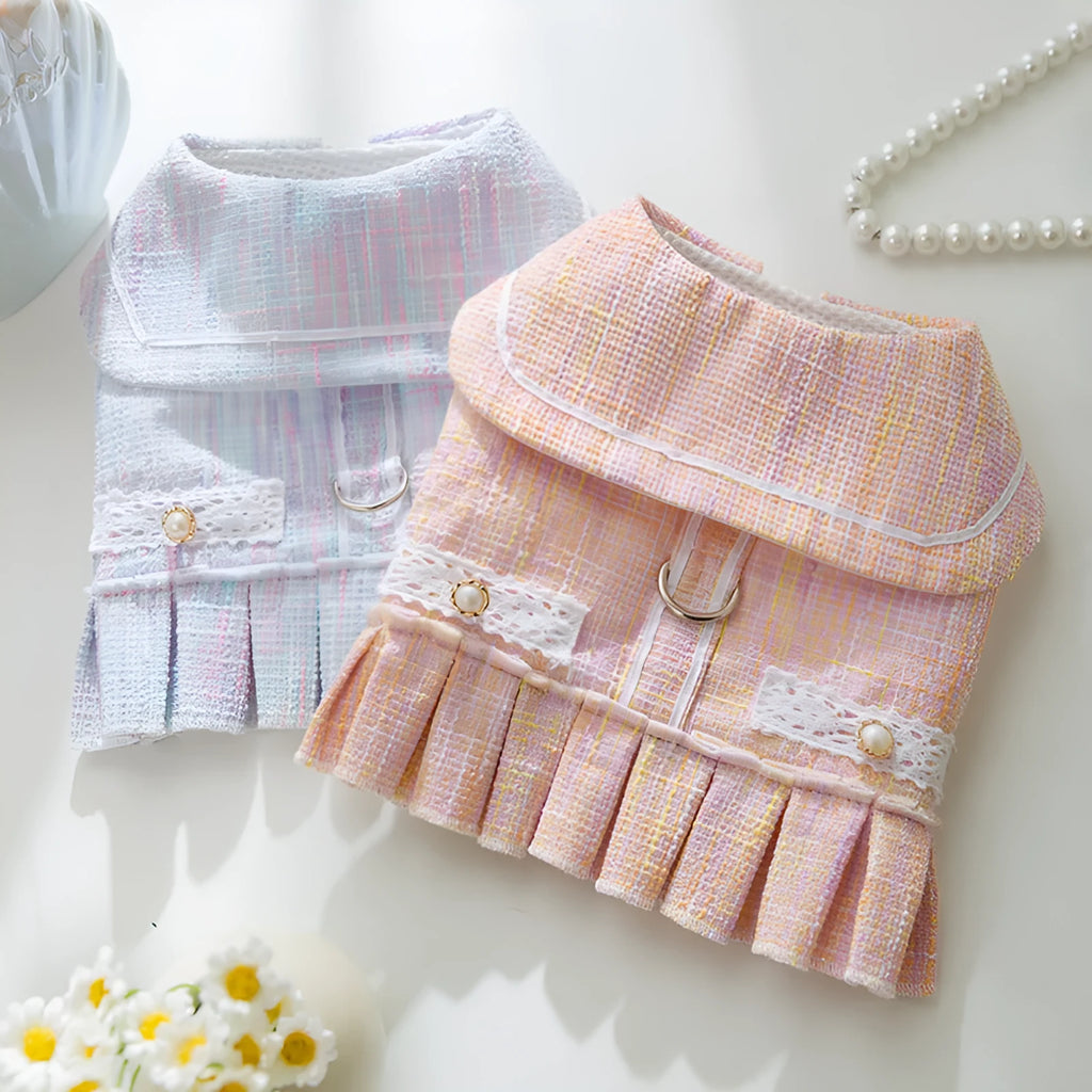 Small dog or cat clothing in pink or purple with ruffled sleeves, showing four size options for pets 1.5kg to 7.5kg