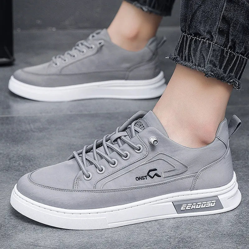 Grey men's canvas casual shoes with round toe and front lace-up design