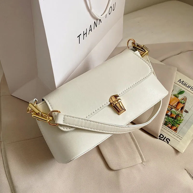 French casual brown PU underarm shoulder bag with chain strap and horizontal square sandwich pocket design.