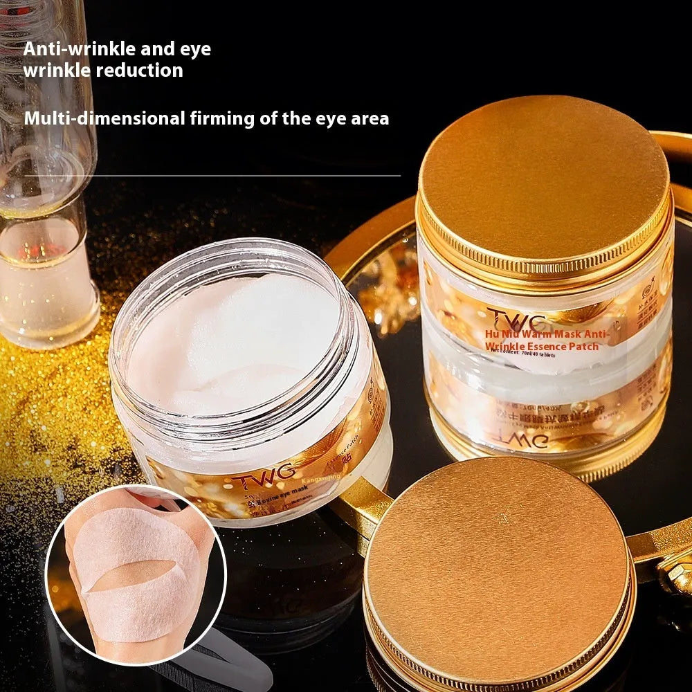 Box of 40 snail essence hydrating eye mask tablets for anti-wrinkle and dark circle care.