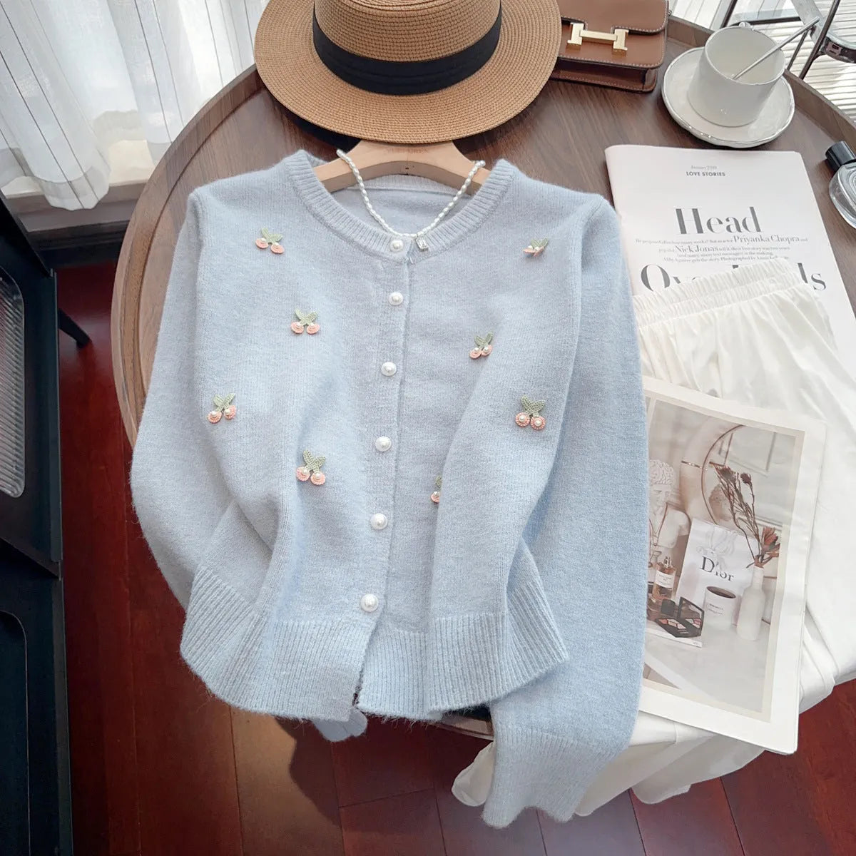 Cashmere blend cardigan with beaded detailing in slim fit silhouette, available in pink, red, white, and blue colours