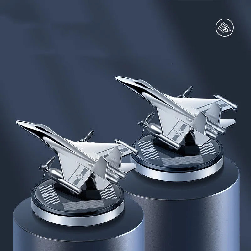 Solar-powered rotating fighter jet perfume ornament in silver, gold, blue, or red with aluminium alloy construction
